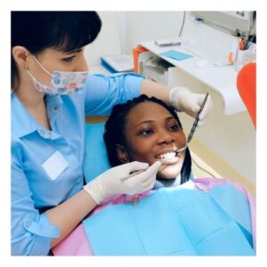 woman looking in a mirror after dental composite work