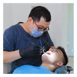 man getting dental work done